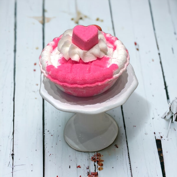 mini pie bath bombs on a cake stand