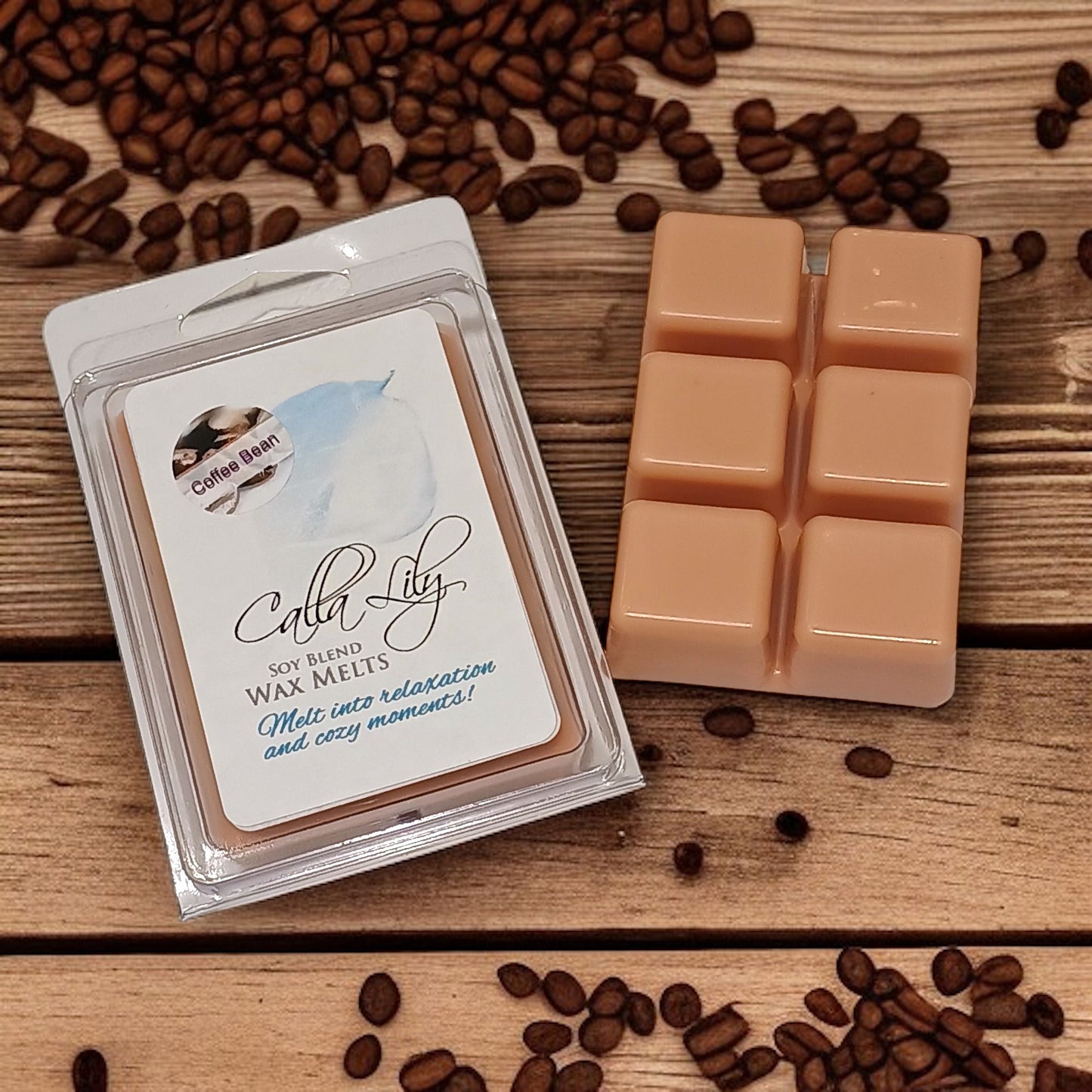 Candle melts packaging with coffee beans on a wooden surface