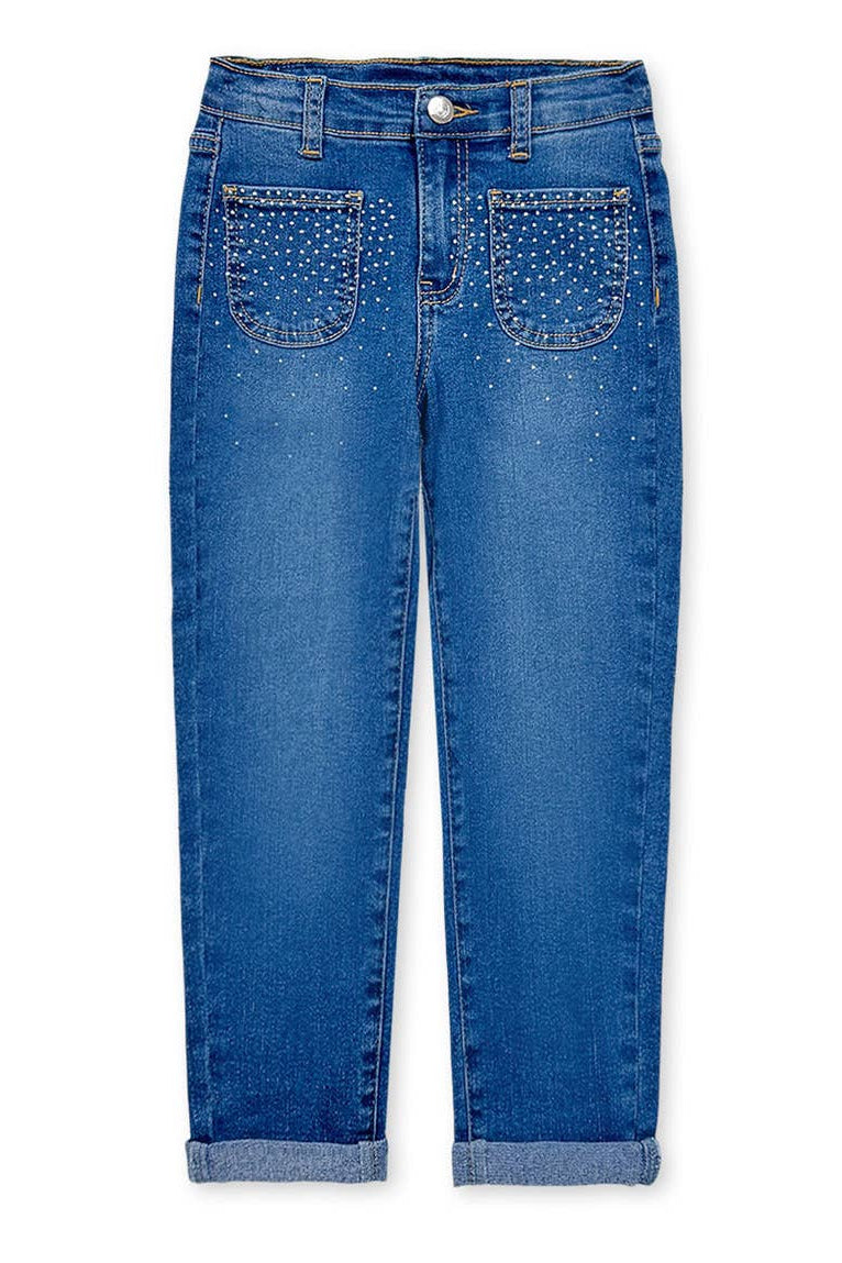 Blue jeans with studded details on a white background