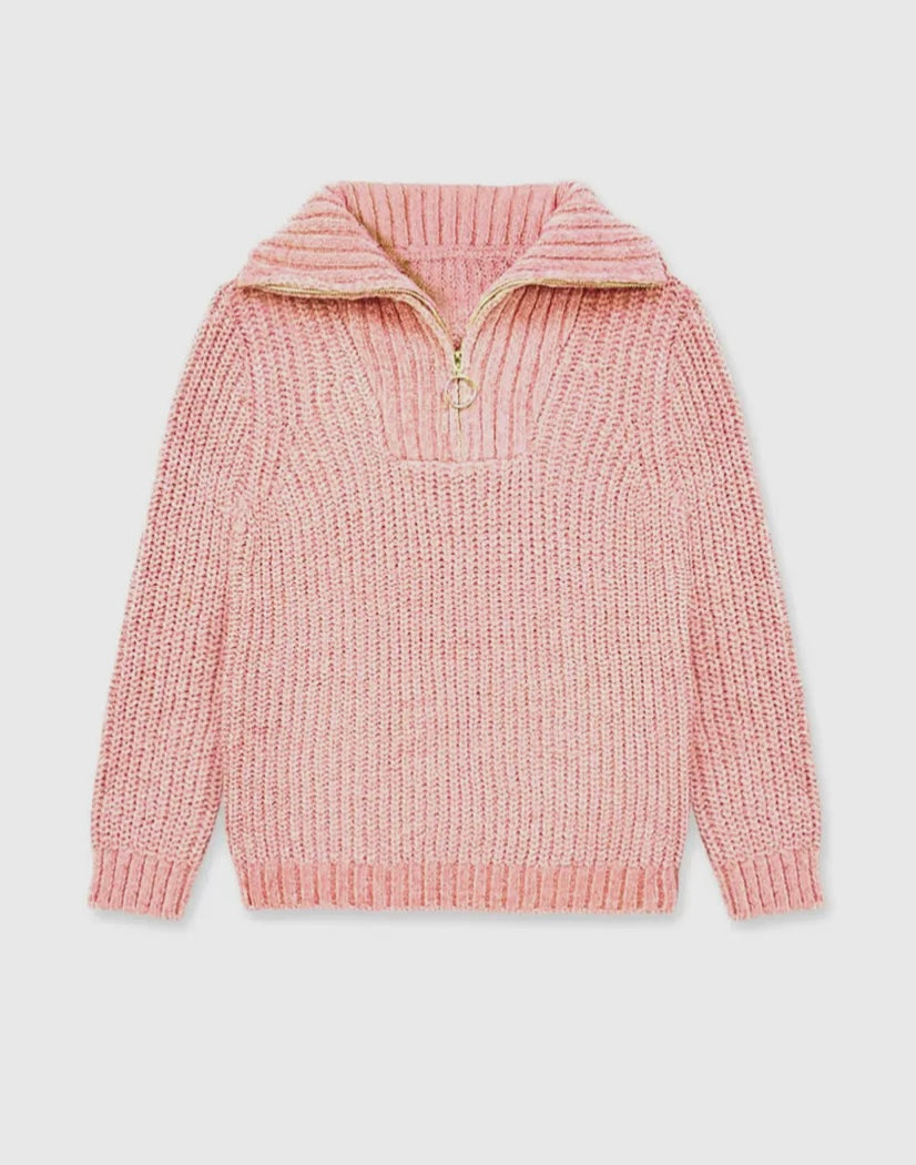 Pink knitted pullover with a zipper on a light gray background