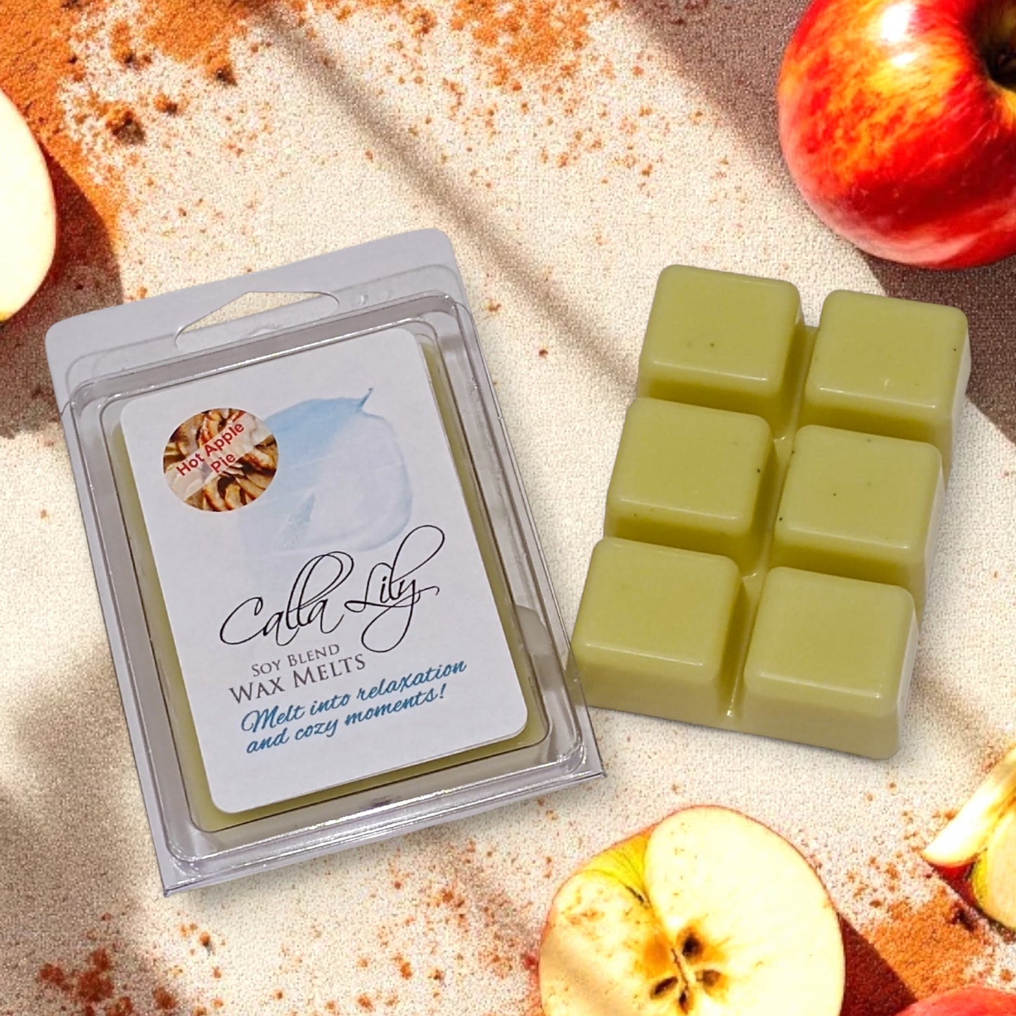 Cath Lily soy blend wax melts with apples on a textured surface