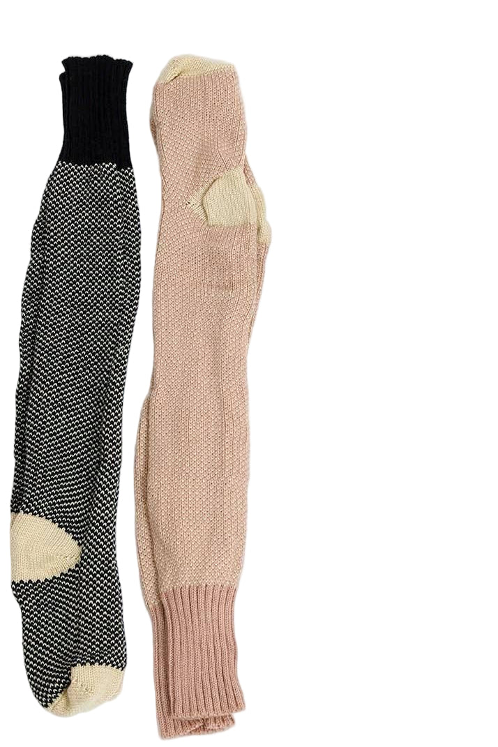 Two pairs of socks, one black and gray patterned, the other beige, on a white background.