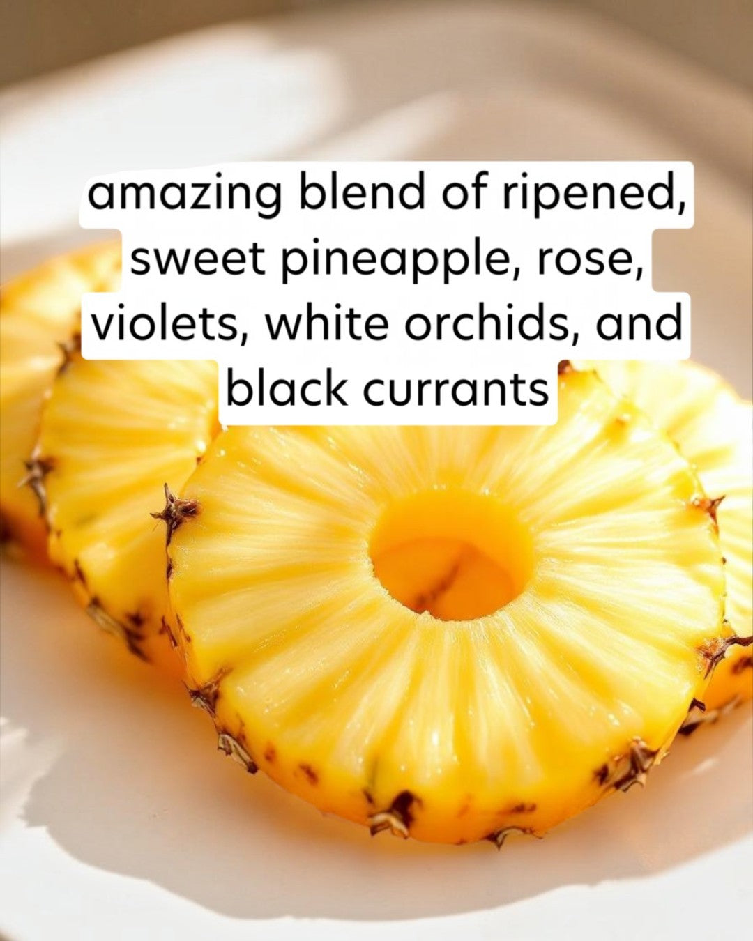 Sliced pineapple on a white plate with descriptive text overlay.