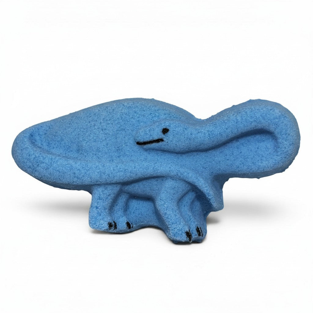 Calla Lily Cosmetics + CL kids blue brontosaurus shaped bath bomb with blood orange scent for kids.