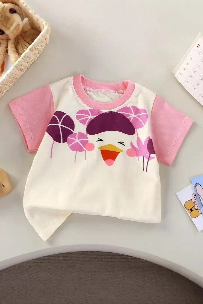 Children's t-shirt with cartoon design on a light surface