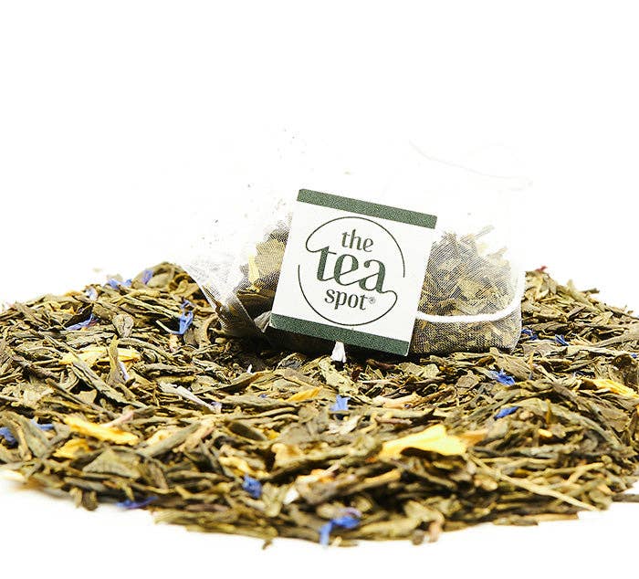 Tea leaves with a 'the tea spot' label on a white background