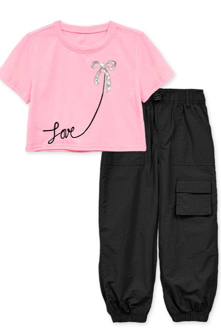 pink top and black pants set