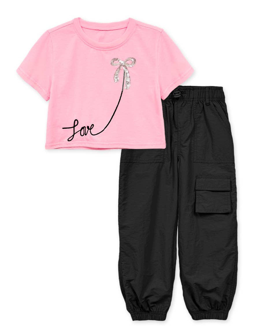 pink top and black pants set
