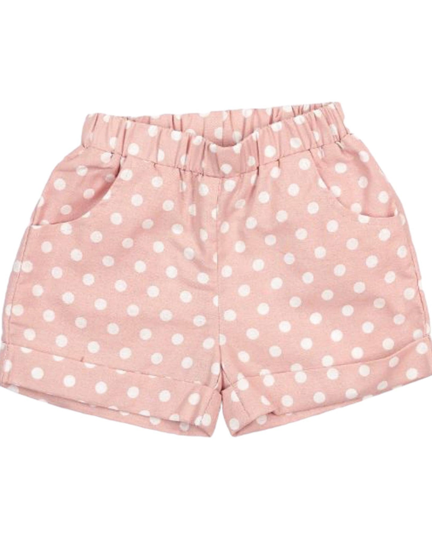 Pink shorts with white polka dots on a white background
