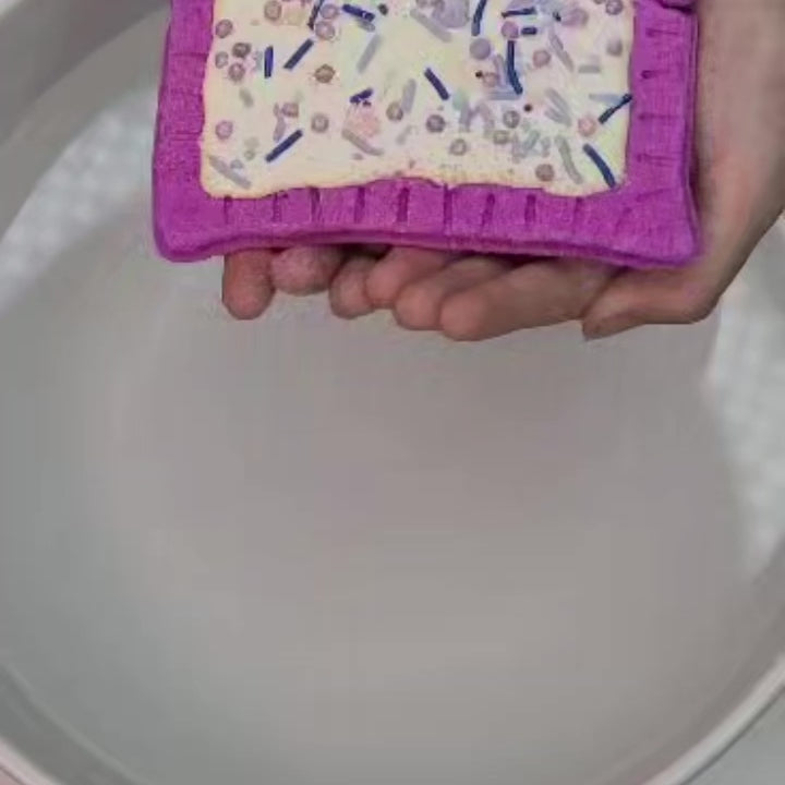movie of purple pop tart ath bomb dissolving in water
