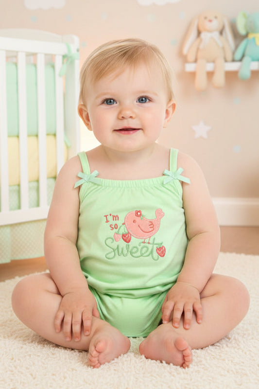 Light green baby romper with 'I'm so sweet' text and bird design on a white background
