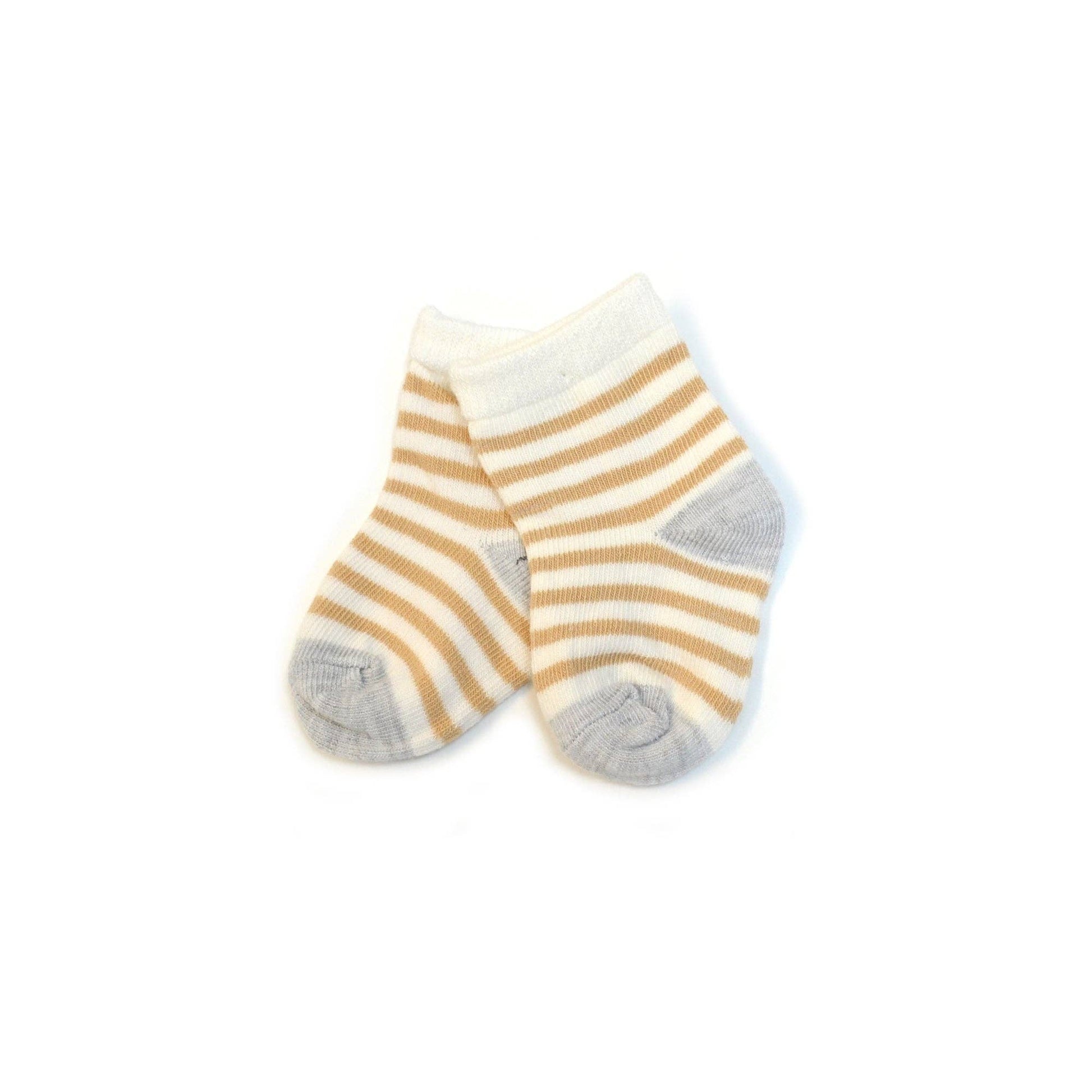 Pair of striped socks with yellow and gray pattern on a white background