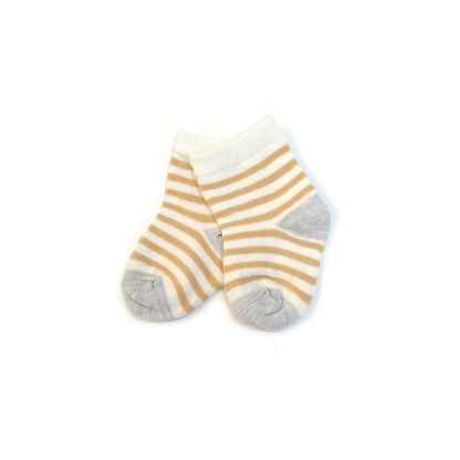 Pair of striped socks with yellow and gray pattern on a white background