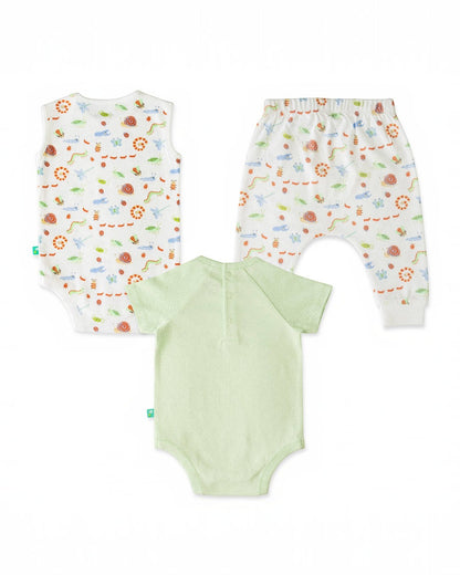 Baby outfit set with floral-patterned pants and a green bodysuit on a white background