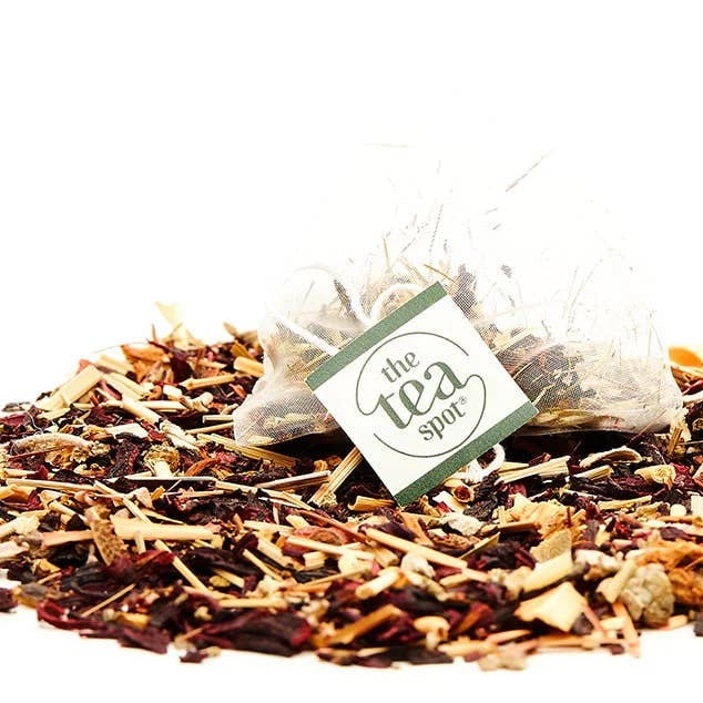 Tea leaves with 'The Tea Spot' label on a white background