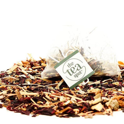Tea leaves with 'The Tea Spot' label on a white background