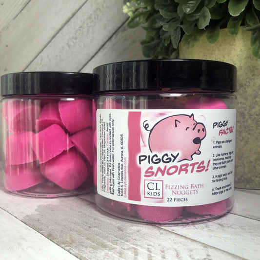 Two jars of our pink gumdrop shaped piggy snorts bath bombs,