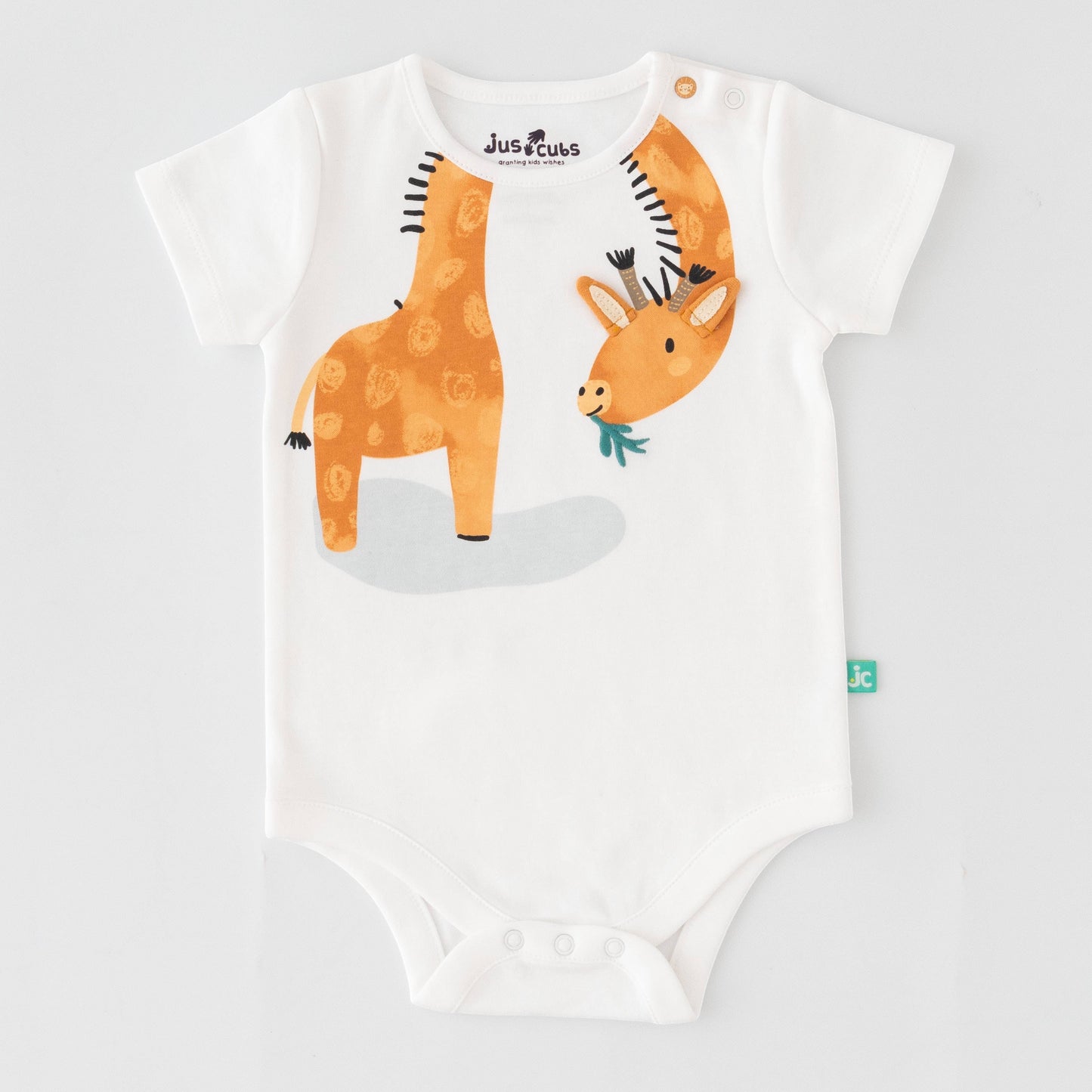 Baby onesie with a giraffe design on a white background