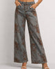 Floral patterned wide-leg jeans on a plain background
