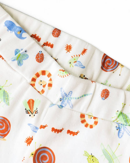 Children's fabric with colorful animal prints on a white background