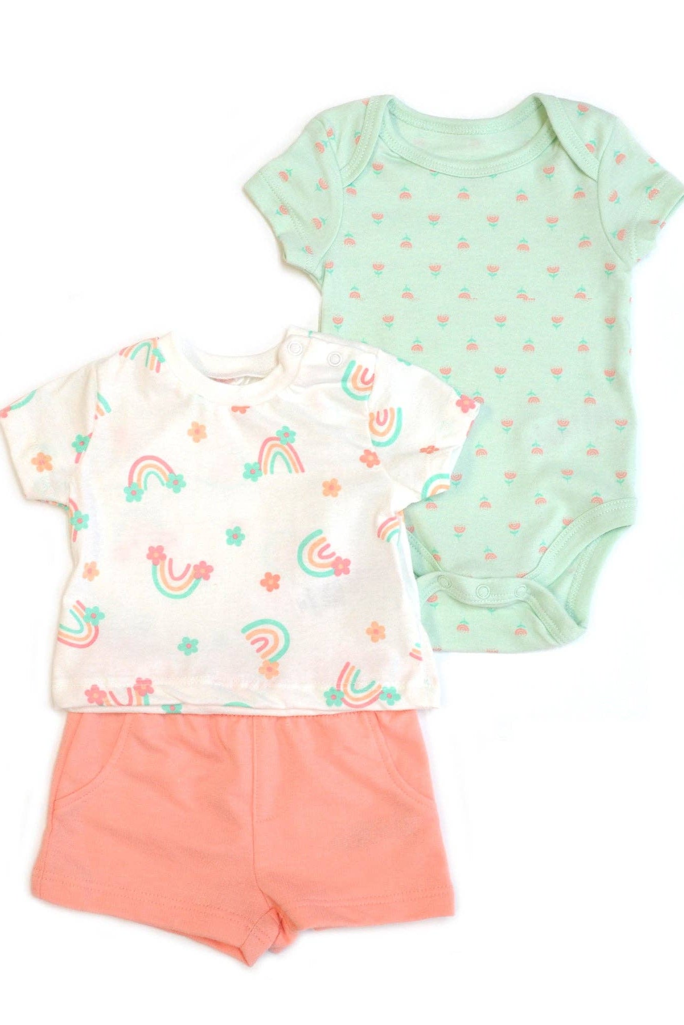 Baby outfit set with t-shirt, shorts, and onesie on a white background