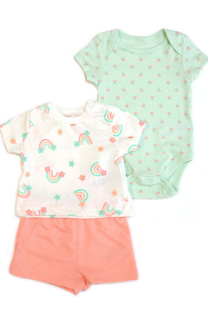 Baby outfit set with t-shirt, shorts, and onesie on a white background