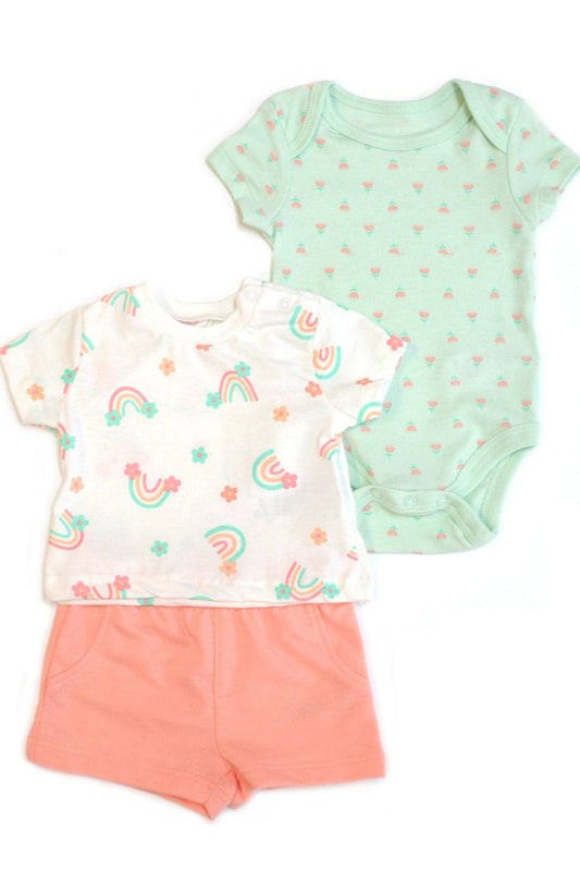 Baby outfit set with t-shirt, shorts, and onesie on a white background