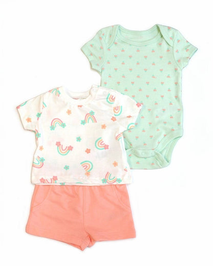 Baby outfit set with t-shirt, shorts, and onesie on a white background