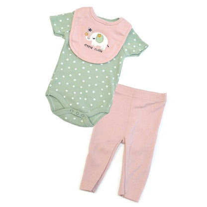 Baby outfit with green polka dot onesie, pink bib, and matching pants on a white background