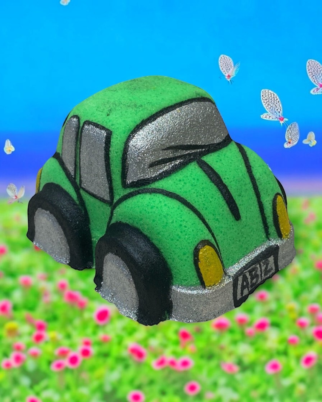 Calla Lily Cosmetics + CL kids green Volkswagen Bug shaped bath bomb with silver and black details