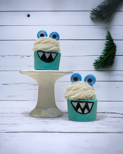 Calla Lily Cosmetics + CL kids teal monster bath bombs shaped like cupcakes with googly eyes and white bubble icing