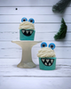 Calla Lily Cosmetics + CL kids teal monster bath bombs shaped like cupcakes with googly eyes and white bubble icing