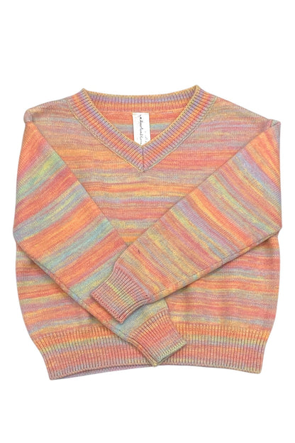 Colorful striped sweater on a white background