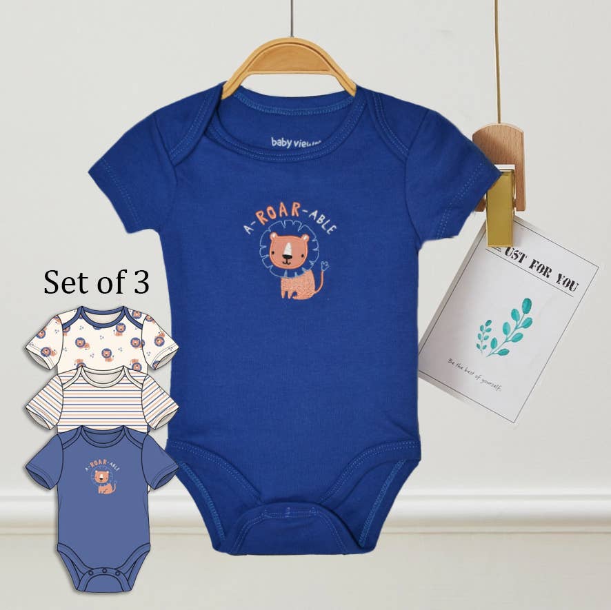Blue baby bodysuit with lion design on a hanger, set of three shown below.
