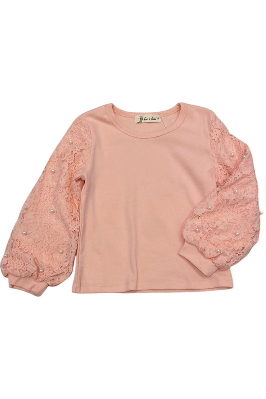 Pink sweater with lace sleeves on a white background
