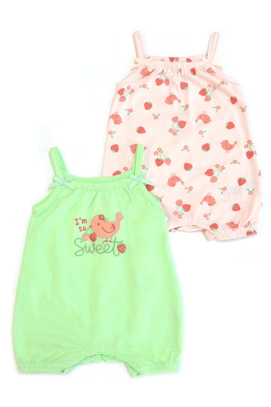 Two baby rompers, one green and one pink with floral pattern, on a white background.