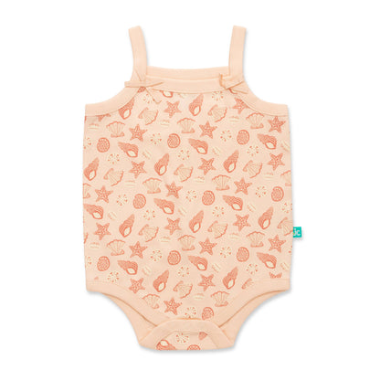 Baby romper with sea-themed pattern on a white background