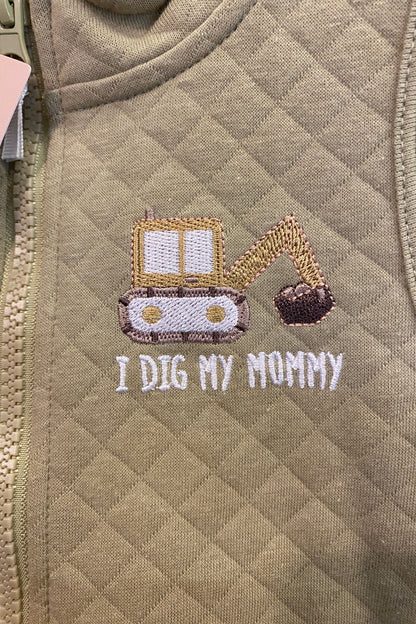 Khaki fabric with embroidered design and text 'I Dig My Mommy'