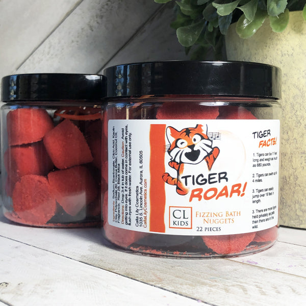 Two jars of our blood orange gumdrop shaped tiger roar bath bombs