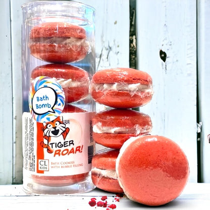 A stack and tube of red orange tigers blood bath cookies against a wood background