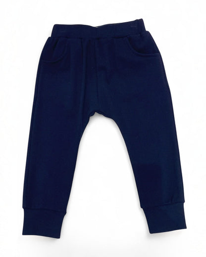 Navy blue baby pants on a white background