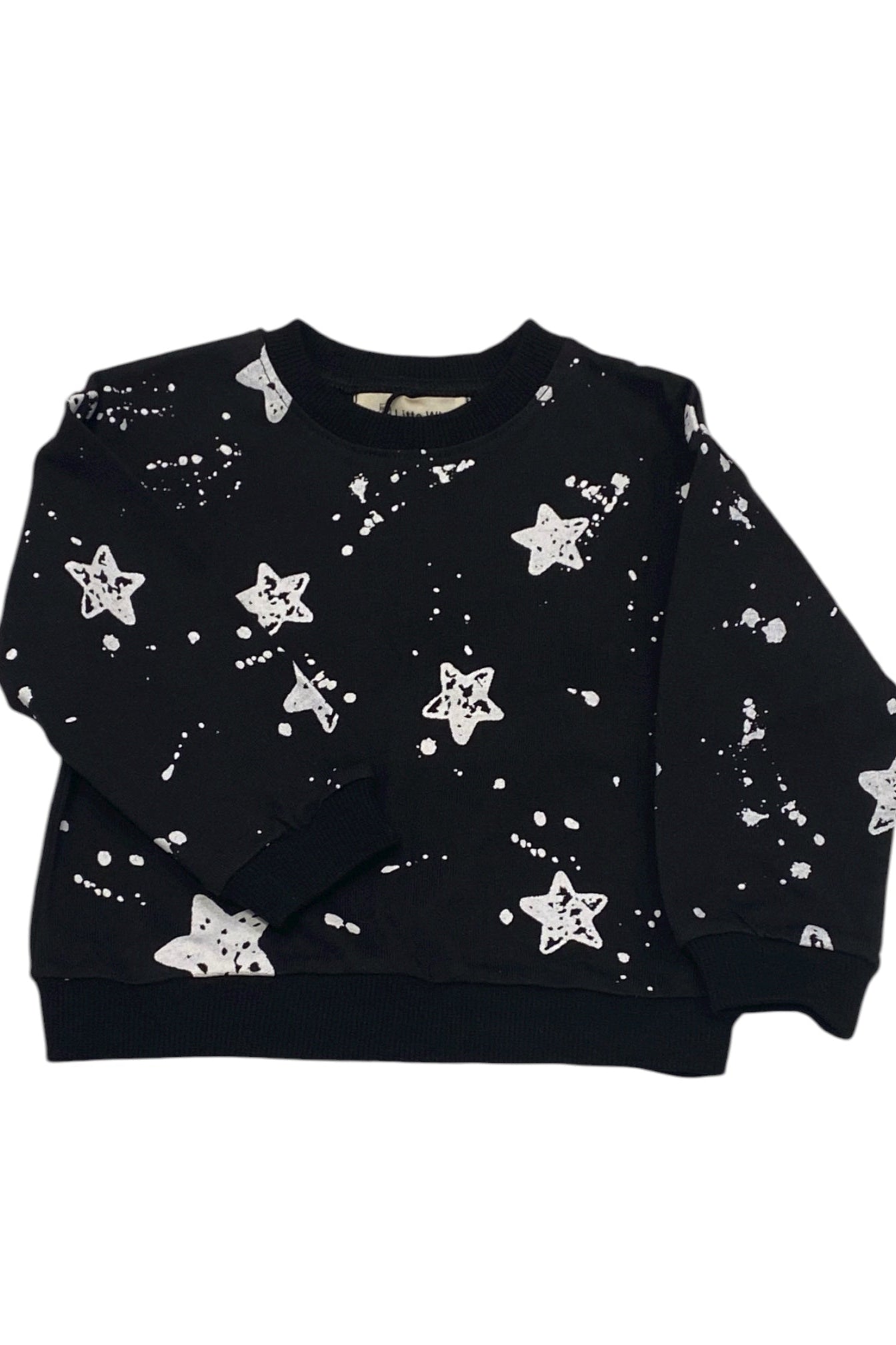 Black sweater with white star patterns on a white background