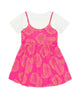 Pink dress with yellow floral pattern on a white background