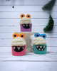 Calla Lily Cosmetics + CL kids monster bath bombs in purple, pink, and teal with bubble icing and googly eyes