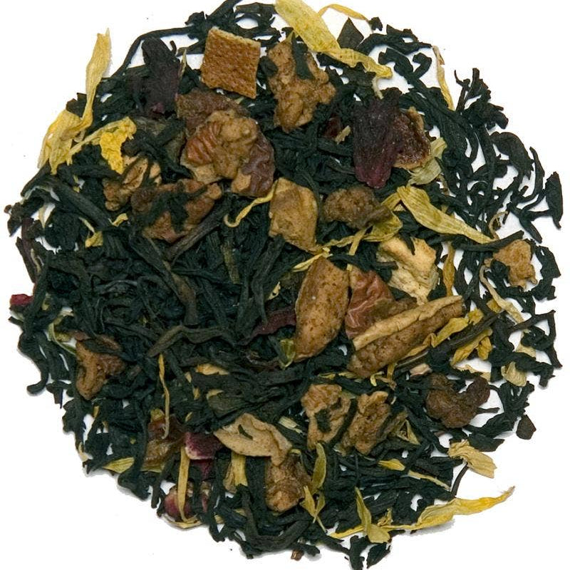 Assorted dried tea leaves on a white background