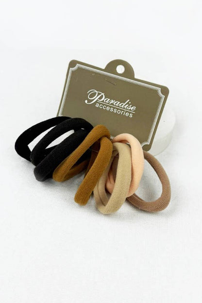 Set of hair ties on a white background with 'Paradise Accessories' branding.