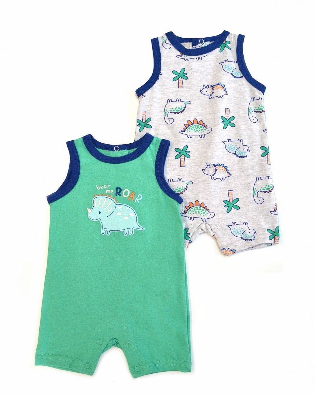 Two baby rompers with dinosaur prints on a white background