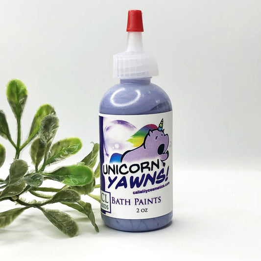 A bottle of our purple Unicorn Yawns bath paints against a white background