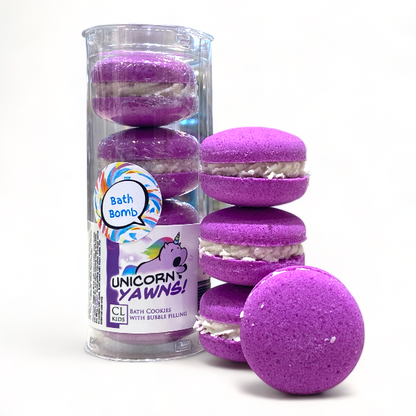 A stack and tube of purple unicorn yawns bath cookies against a white background