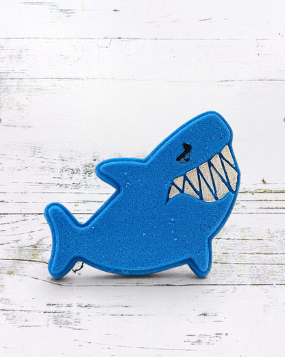 Calla Lily Cosmetics + CL kids blue shark-shaped bath bomb with blueberry scent and cocoa butter for kids
